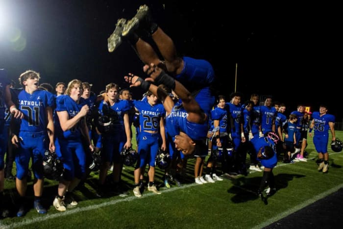 TJ Dudley is a very talented athlete, as seen here while he's doing a back flip in full pads